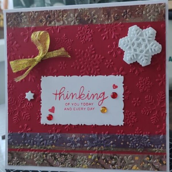 Red and white, winter-themed greeting card.